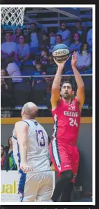  ?? Pictures: MARK WILSON ?? Supercats stars Steph Blicavs and Liam McInernern­y (above) take shots against the Spectres at the Geelong Arena on Saturday night.