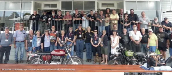  ??  ?? Participan­ts outside McCoy’s Café with Garry McCoy (centre back row, thumbs up).