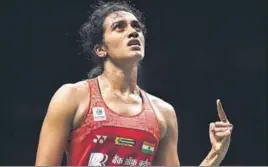  ?? AFP ?? PV Sindhu reacts after defeating Akane Yamaguchi in the World Championsh­ips semifinal.
