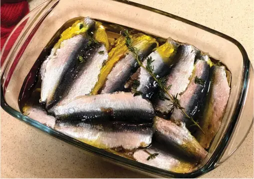  ??  ?? Salted & pickled sardines.