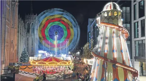  ?? Photograph by Kenny Elrick ?? WINTER GLORY: The official opening of Aberdeen Christmas Village on Broad Street.