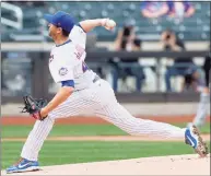  ?? Sarah Stier / Getty Images ?? The Mets’ Jacob deGrom pitches during the first inning against the Miami Marlins at Citi Field on Saturday.