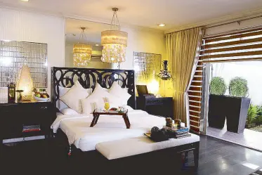  ??  ?? Doña Anita, one of the boutique hotel’s spacious suites, is named after the Cuevas family’s matriarch.