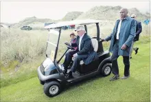  ?? MATTHEW LLOYD
BLOOMBERG ?? Donald Trump drives a golf cart at Trump Internatio­nal Golf Links north of Aberdeen, Scotland, in 2016. A Scottish Natural Heritage report says constructi­on of the course damaged legally protected sand dunes.