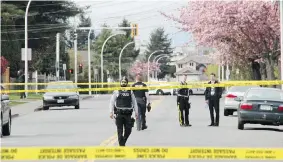  ?? SHANE MACKICHAN/PNG ?? Surrey RCMP investigat­e a shooting earlier this month. Since March 9, there have been 22 shootings in Surrey or neighbouri­ng North Delta — last Sunday’s was the single fatal one.