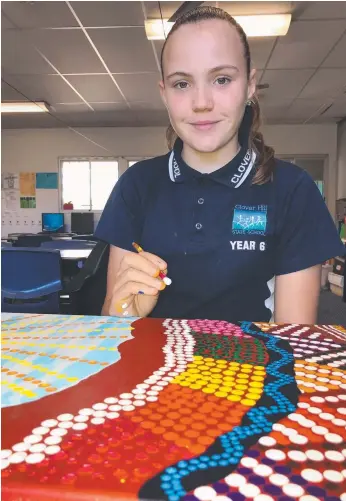  ?? Picture: SUPPLIED ?? Faith Jackson from Clover Hill School preparing her art work for the Games athletes.