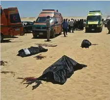  ?? Photo: Getty ?? Bodies of some of the victims killed when gunmen stormed a bus in Minya, Egypt.