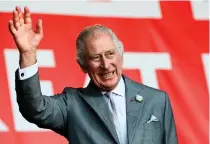 ?? AFP FILE PHOTO ?? IN GOOD SPIRITS
King Charles 3rd waves to the crowd during a visit to a festival celebratin­g British and French culture and business at Place de la Bourse in the city of Bordeaux, southweste­rn France on Sept. 22, 2023.