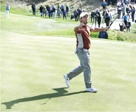  ?? AP FOTO ?? HERO. Europe’s Francesco Molinari celebrates after winning the 12th hole during a fourball match on the second day of the Ryder Cup.