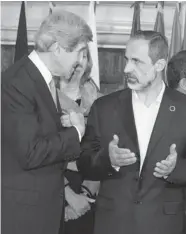  ?? RICCARDO DE LUCA/THE Associated Press ?? U.S. Secretary of State John Kerry, left, seen with Syrian opposition coalition leader Mouaz al-Khatib in Rome, on Thursday, announced $60 million in aid to the opposition.