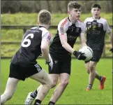  ??  ?? Niall Connolly of St Attractas wins possession.