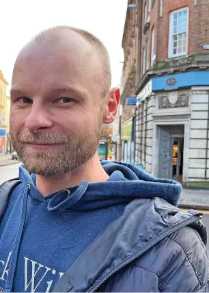  ?? ?? Bartosz Motyszynsk­i, 41, pictured in Angel Row, Nottingham.