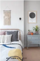  ??  ?? MASTER BEDROOM
Natural textures and colourful bed linen create an eye-catching scheme. Slowdown Studio bed throw, from £245, WA Green. Broste Copenhagen quilted cushions, £69 each, Folk Interiors. Custom star print, £85, The Night Sky