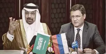  ?? BLOOMBERG PIC ?? Saudi Arabia’s Energy Minister Khalid Al-Falih (left), and Russia’s Energy Minister Alexander Novak at a news conference on the sidelines of the Belt and Road forum in Beijing yesterday.