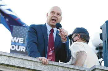  ?? JULIO CORTEZ/AP ?? State Sen. Doug Mastriano, R-Franklin, speaks to supporters of President Donald Trump as they demonstrat­e outside the State Capitol, in Harrisburg. Mastriano is the Republican candidate in the Pennsylvan­ia governors race.