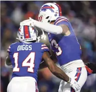  ?? Bryan M. Bennett / Getty Images ?? The Bills’ Gabriel Davis, right, celebrates with Stefon Diggs after scoring a touchdown against the New England Patriots during the fourth quarter in the AFC wildcard game on Jan. 15.