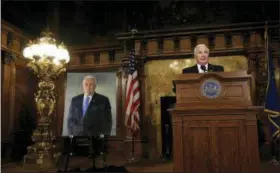  ?? JACQUELINE LARMA - THE ASSOCIATED PRESS ?? Former Pennsylvan­ia Gov. Tom Corbett makes remarks following the unveiling of his official portrait Wednesday Oct. 24, at the Capitol in Harrisburg. The oil-on-canvas painting was done by Catherine Prescott, who taught painting and drawing for 20 years at Messiah College. The 69-year-old former governor posed in Prescott’s Mechanicsb­urg studio in the summer of 2017 for a set of photos that were used to create the painting.