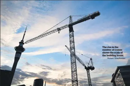  ?? Picture / Greg Bowker ?? The rise in the number of cranes shows the scale of the building boom.