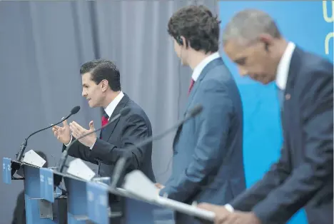  ?? BRENDAN SMIALOWSKI/AFP/GETTY IMAGES ?? Mexican President Enrique Pena Nieto, left, Prime Minister Justin Trudeau and U.S. President Barack Obama have pledged to chop methane gas emissions from the oil and gas industry by 40 to 45 per cent as part of a new climate change strategy.