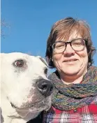  ?? [COURTESY OF MARY SAUP] ?? Mary Saup, with her pitbull, Lucy, has registered to participat­e in this year’s WAG! Wilderness Walk over Labor Day weekend.