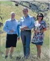  ??  ?? Living land: Patrick Materman of Brancott Estate, centre, celebrates the release of falcon chicks with Marlboroug­h Falcon Trust representa­tives Heath Stafford and Amanda Simcic.