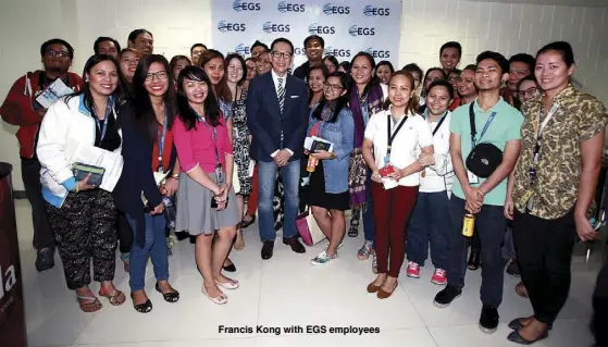  ??  ?? Francis Kong with EGS employees