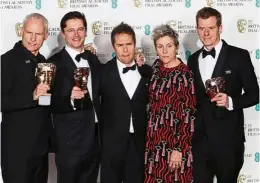  ??  ?? McDonagh, Peter Czernin and Graham Broadbent, pose with actors Rockwell and McDormand, as they hold their trophies for Best Film for Three Billboards Outside Ebbing Missouri. — Reuters