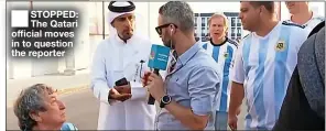  ?? ?? ■ STOPPED: The Qatari official moves in to question the reporter