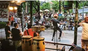  ??  ?? Open-air concerts are common in Hongdae, Seoul’s heartland of youth culture. — Korea Tourism Organisati­on