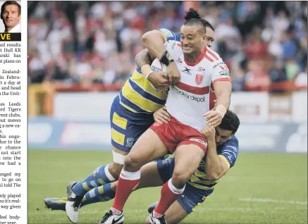  ?? PICTURE: JONATHAN GAWTHORPE ?? Hull Kingston Rovers’ Weller Hauraki is brought down by the Warrington Wolves defence.
