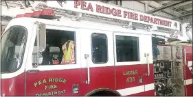  ??  ?? A fire ladder truck has new life as the newest addition to the Pea Ridge Fire Department thanks to a donation from the Rogers Fire Department, said Pea Ridge Fire Chief Jack Wassman. (NWA Democrat-Gazette/Annette Beard)