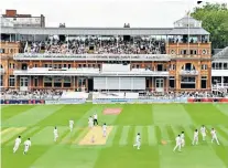  ??  ?? Subtle glance: England captain Joe Root cuts the ball towards the boundary during his unbeaten 48, and (left) James Anderson celebrates the wicket of India’s Ajinkya Rahane