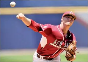  ?? NWA Democrat-Gazette/MICHAEL WOODS ?? Arkansas right-hander Trey Killian said watching the new lower-seam baseballs travel in batting practice can be discouragi­ng, but he said there is a better feel for the ball.