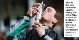  ?? REUTERS ?? Nico de Boinville celebrates with the trophy after riding Altior to victory in the Queen Mother Champion Chase at Cheltenham yesterday