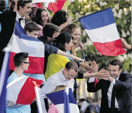  ??  ?? VICTORY: Emmanuel Macron’s win in the French presidenti­al election was greeted as a reassuring result for the establishm­ent