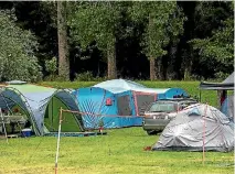  ??  ?? Campers at Totara Reserve had to batten down the hatches during a downpour on Thursday.