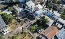  ?? Photograph: Shadi Al-Tabatibi/AFP/Getty Images ?? Aerial view of the complex housing al-Ahli Arab hospital in Gaza City in the blast aftermath.