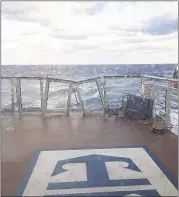  ??  ?? FLAVIO CADEGIANI VIA AP This image made available by Flavio Cadegiani shows damage to the deck of Royal Caribbean’s ship Anthem of the Sea s on Monday af ter sailing into a power ful storm at sea Sunday.