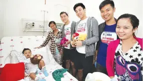  ??  ?? JR. NBA All-Stars Jarrell Lim and Tyler Tio recently spread holiday cheer to children at the Pediatric Ward of the Philippine Heart Center.