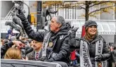  ?? JOHN SPINK / JSPINK@AJC.COM ?? Angela Blank was by Arthur Blank’s side during Atlanta United’s victory parade on Dec. 10. She was not at Sunday’s Falcons’ game.