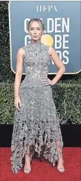  ?? FRAZER HARRISON GETTY IMAGES ?? Emily Blunt, the "Mary Poppins Returns" star, stood out in an embroidere­d, sleeveless gown from Alexander McQueen.