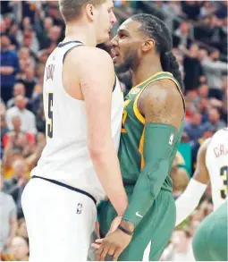  ??  ?? Denver Nuggets center Nikola Jokic, left, and Utah Jazz forward Jae Crowder face off during the first half Wednesday in Salt Lake City. (AP)