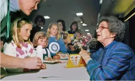  ?? Photograph: Vern Fisher/AP ?? Beverly Cleary signs books at the Monterey Bay Book Festival in Monterey, California, in 1998.