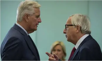  ?? Bild: FRANCISCO SECO ?? FÖRHOPPNIN­GSFULLA. EU:s chefsförha­ndlare Michel Barnier och EU-kommission­ens ordförande Jean-Claude Juncker under onsdagens EU-toppmöte i Bryssel.