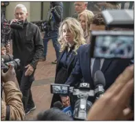  ?? (AP) ?? Theranos founder and Chief Executive Officer Elizabeth Holmes walks into federal court in San Jose, Calif. in November.