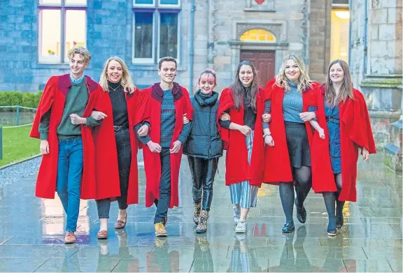  ?? Picture: Steven Brown. ?? Game Of Thrones actress Maisie Williams with students of St Salvator’s Choir.