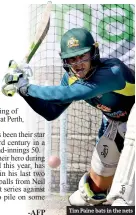  ??  ?? Tim Paine bats in the nets