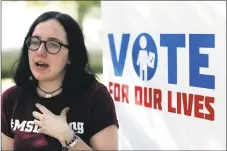  ?? John Raoux / Associated Press ?? Sofie Whitney, an activist and student at Marjory Stoneman Douglas High School in Parkland, Fla., talks about voting during a Vote for Our Lives event at the University of Central Florida in Orlando on Wednesday.