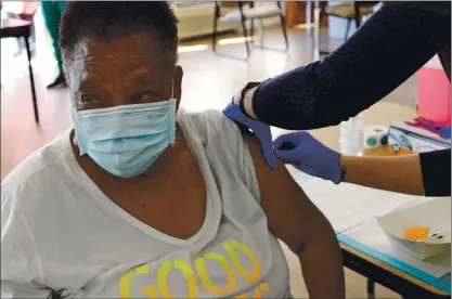  ?? RACHEL BLUTH — KAISER HEALTH NEWS ?? Doris Mason, 72, was invited to get vaccinated as part of an effort to inoculate eligible people in underserve­d areas in Richmond.