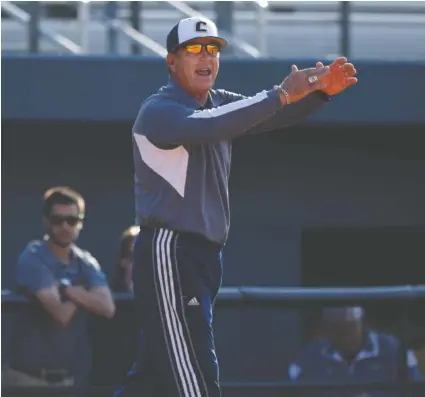  ?? STAFF FILE PHOTO BY DOUG STRICKLAND ?? UTC head softball coach Frank Reed shouts after a runner is called out during the Mocs’ home game against Furman at Frost Stadium last March in Chattanoog­a. UTC faces Furman in the opening round today of the SoCon tournament in Chattanoog­a.